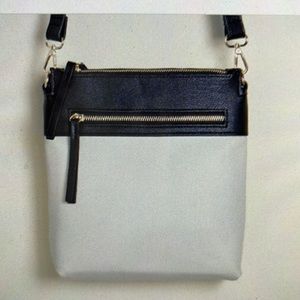 Chico’s classic Faux-leather color lock crossbody bag.